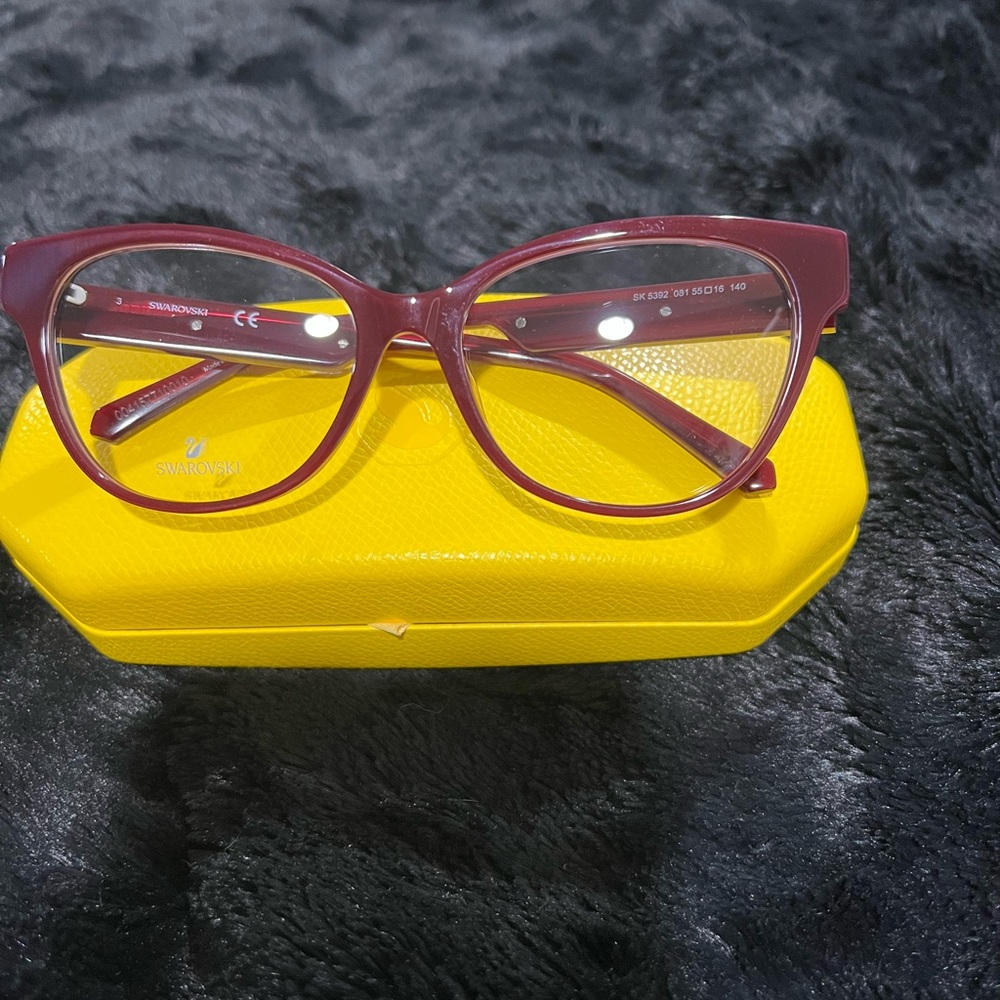Swarovski burgundy glasses with yellow case with Modern Design